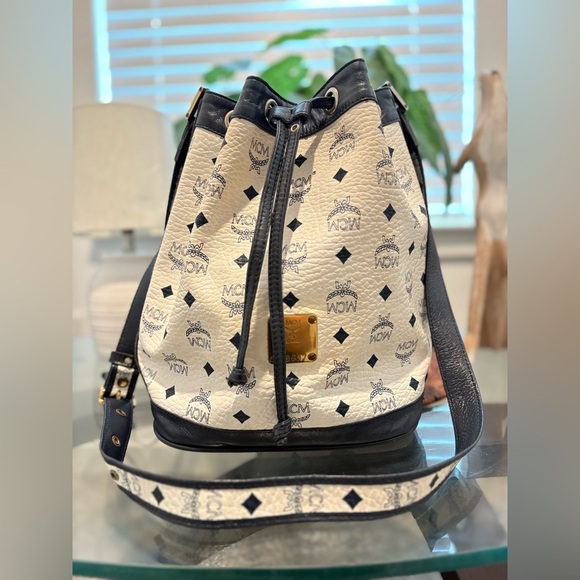 MCM Handbags - MCM White and Black Visetos Drawstring Crossbody Bucket Bag